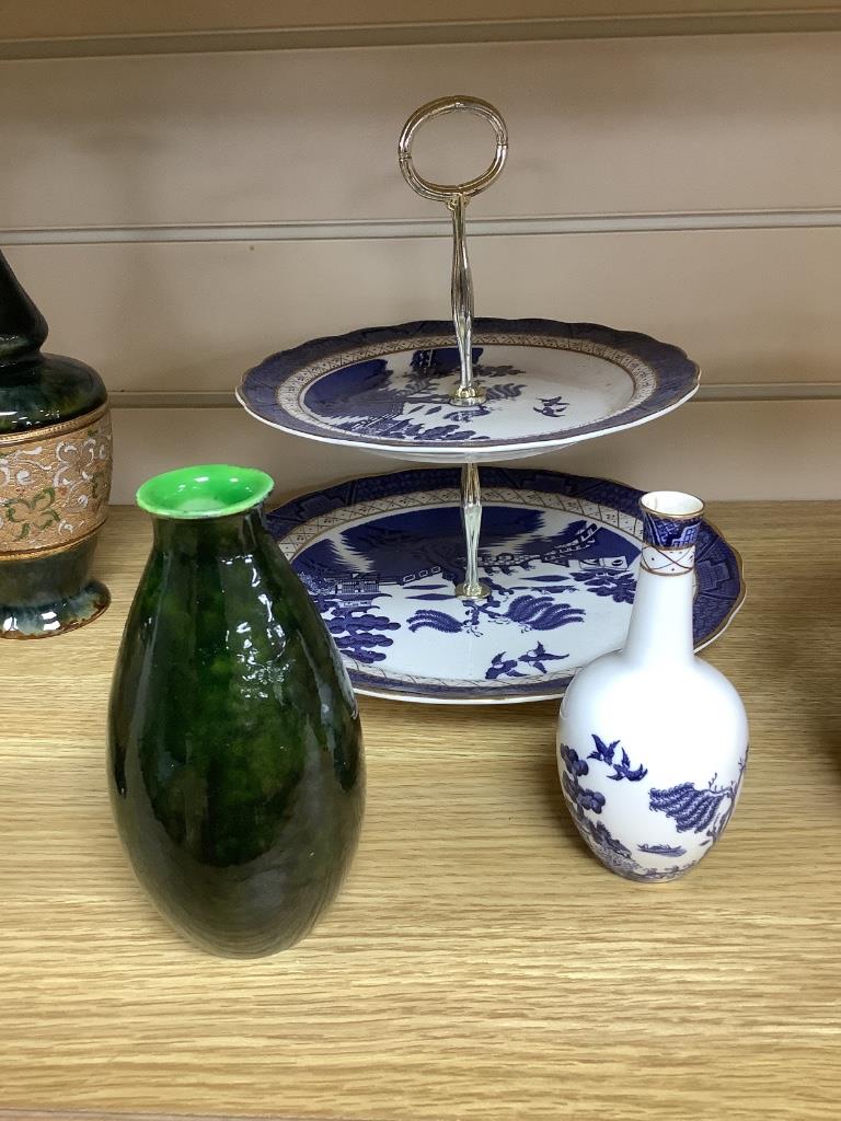 A quantity of mixed Royal Doulton ceramics - 8 vases, a cake stand and a flower pot